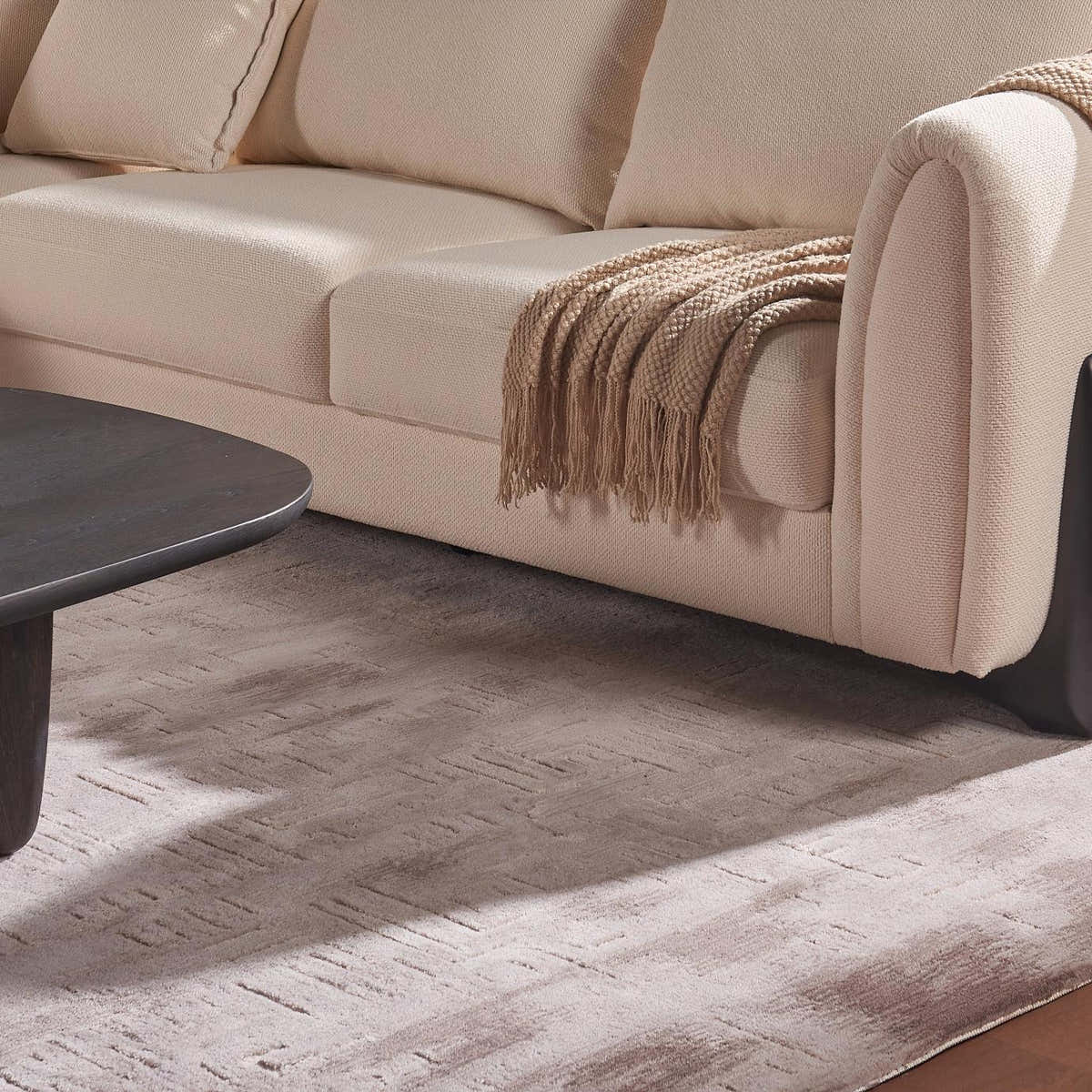 Modern neutral living room with wool blend rug