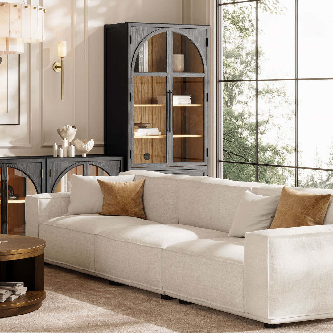 Sectional sofa detail in a modern interior, highlighting upholstery texture and cushion structure