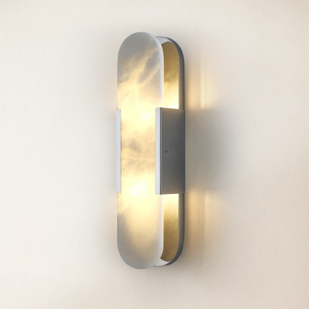 Sophisticated silver wall sconce with oval alabaster shade