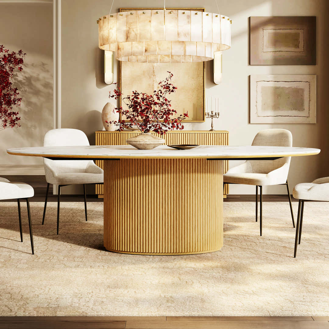Round or sculptural Houlte dining table styled in a modern interior